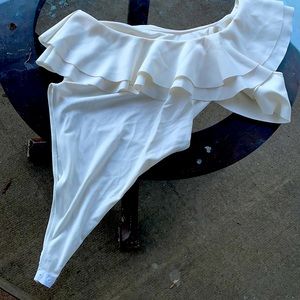 One shoulder bodysuit.